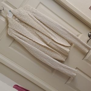 Off white with sparkle of gold jacket